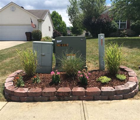 fencing to hide electrical box in yard|hide utility boxes in yard.